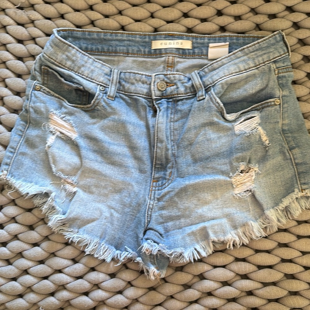 Distressed denim shorts